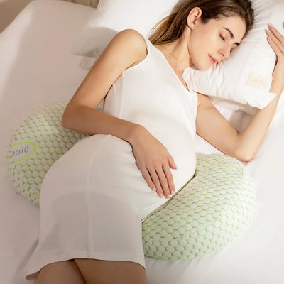Versatile multi-position pregnancy cushion that can be reshaped for lounging, sleeping, or nursing support after birth.